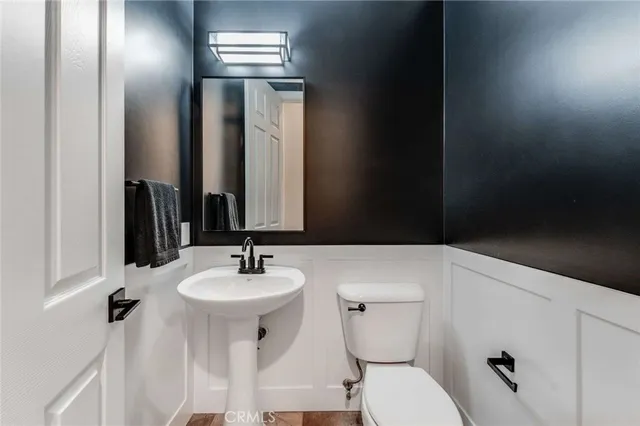 a bathroom with a sink and a toilet