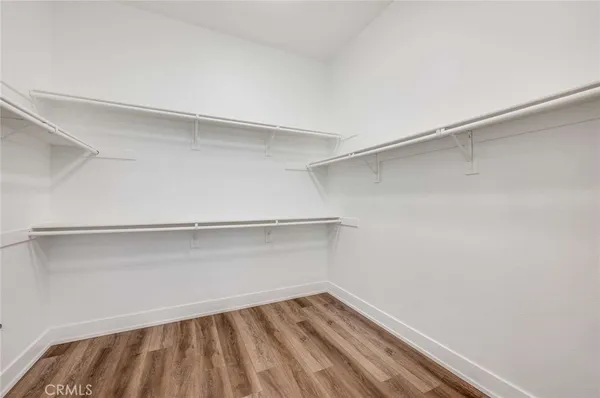 a view of an empty walk in closet