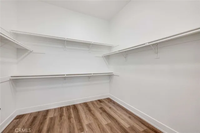 a view of an empty walk in closet