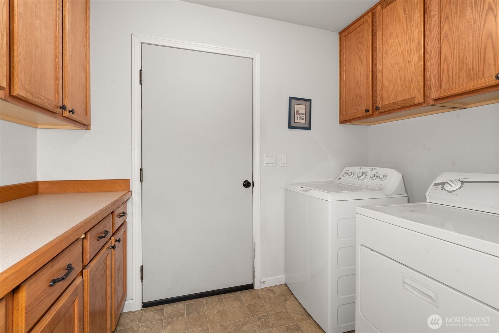 27 Otter Lane Elma, WA 98541 - Photo 18 of 31 a utility room with dryer and washer