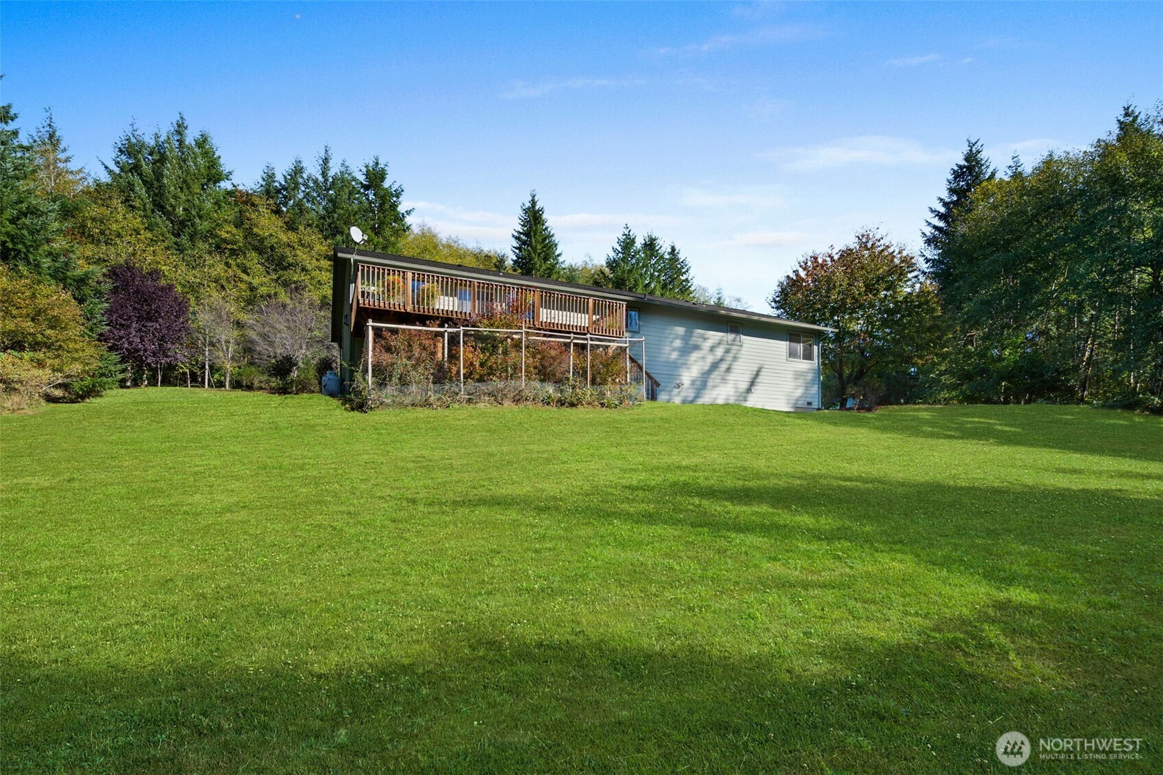 27 Otter Lane Elma, WA 98541 - Photo 26 of 31 a view of a deck with a big yard