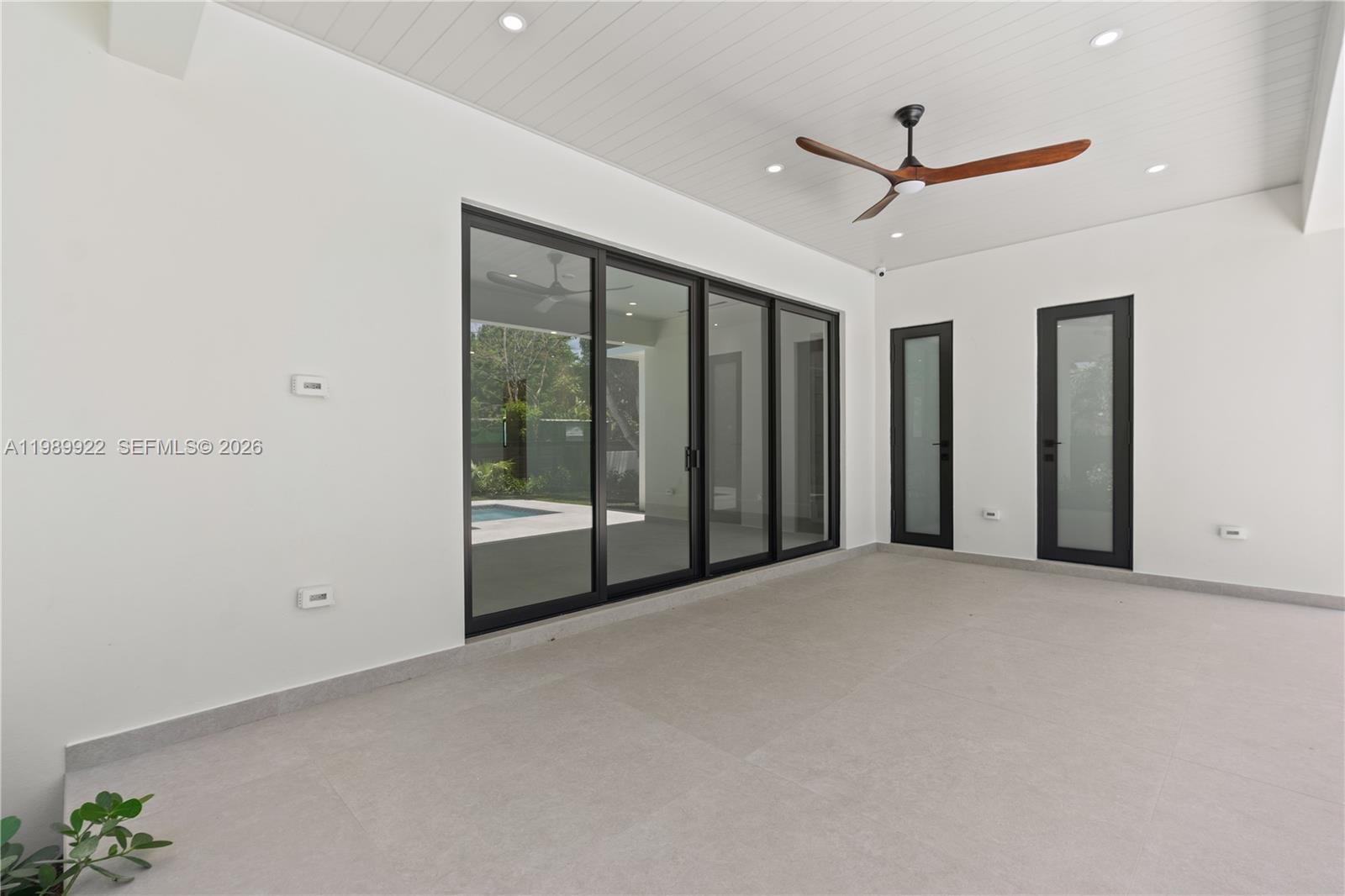 6221 Southwest 60th Street South Miami, FL 33143 - Photo 38 of 42 a view of an empty room with a window