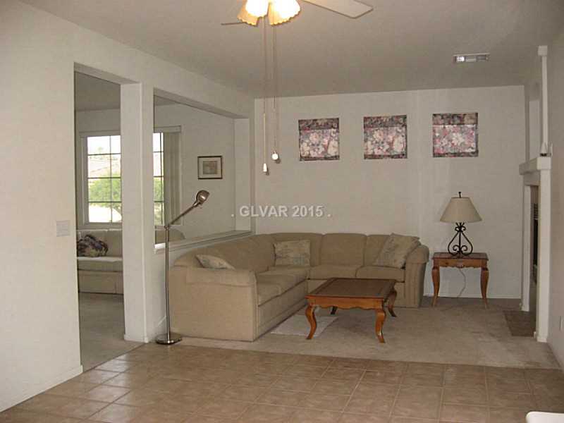 10115 Black Duck Court Las Vegas, NV 89117 - Photo 4 of 16 Family Room.