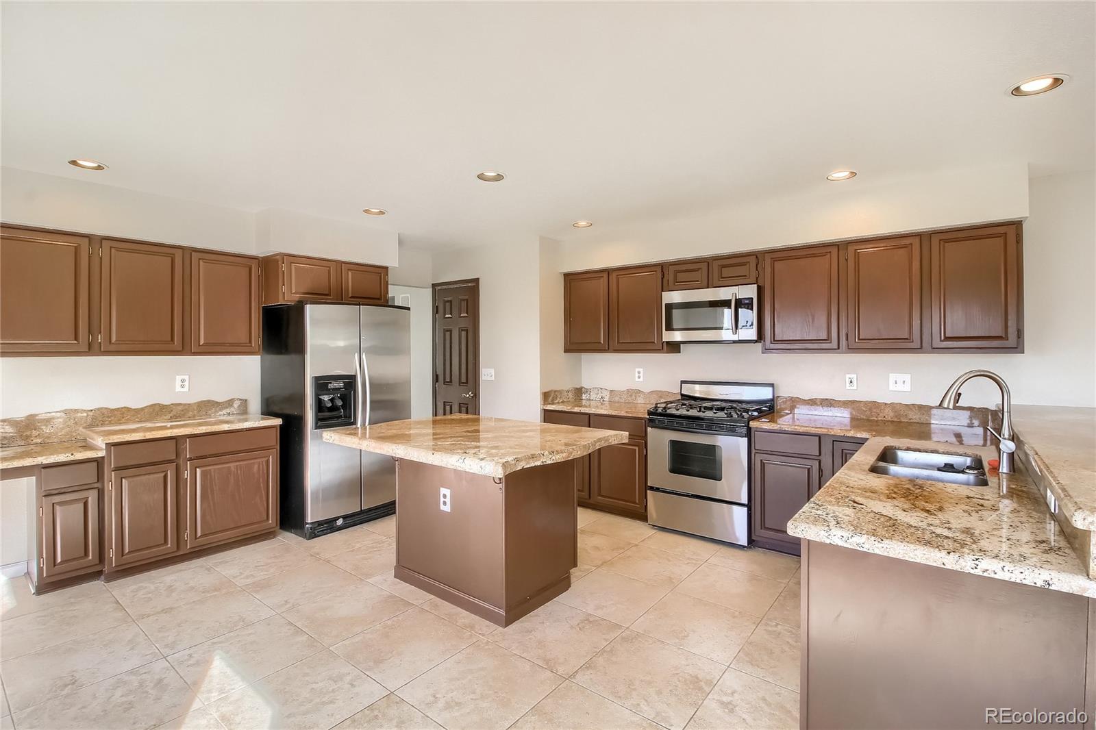 9811 Venneford Ranch Road Highlands Ranch, CO 80126 - Photo 11 of 40 Gallery Image 11