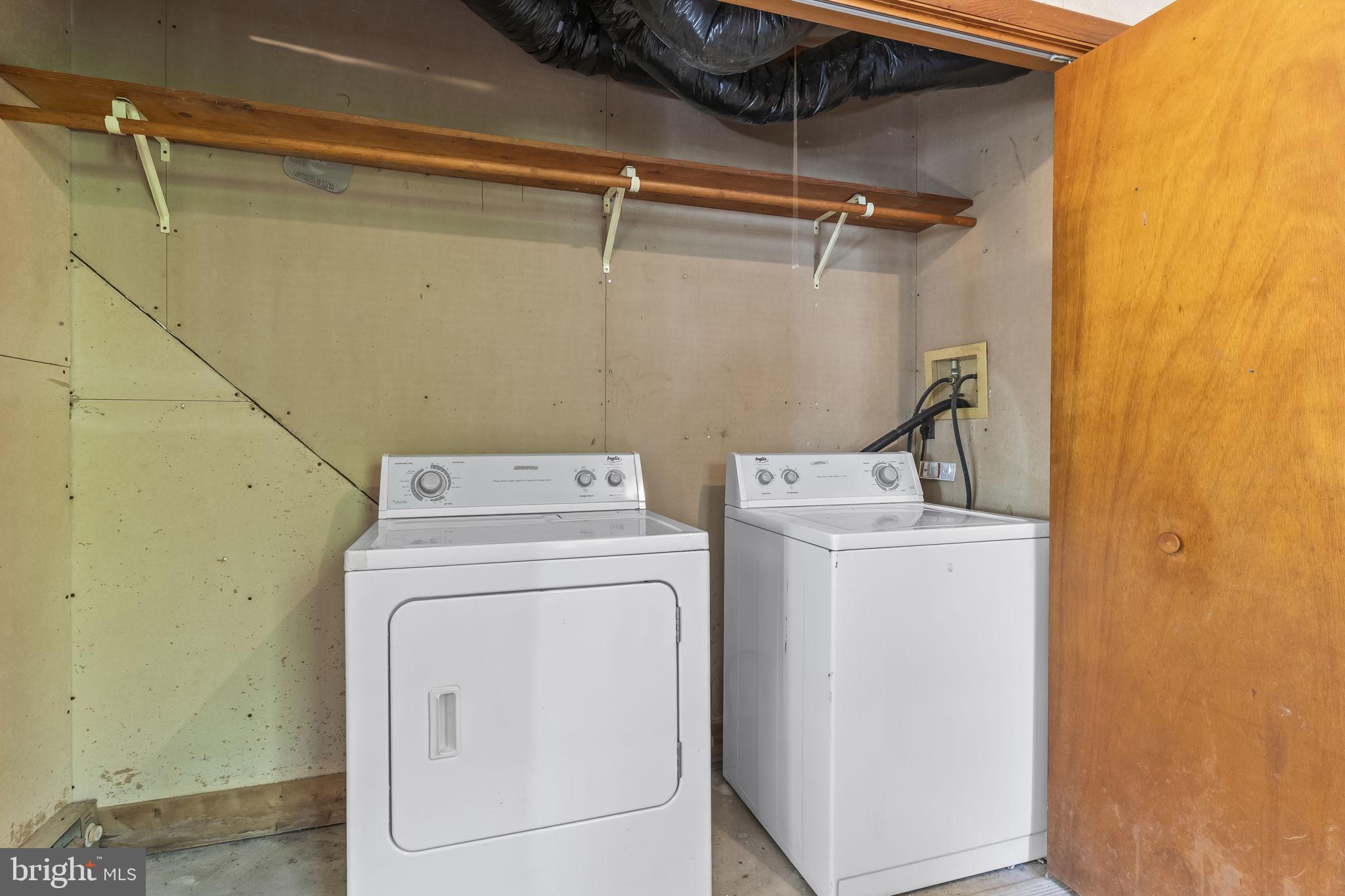 17301 Point Lookout Road Lexington Park, MD 20653 - Photo 64 of 90 Washer and dryer in the garage for the apartment
