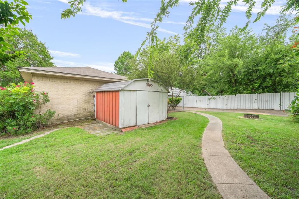 913 Pinson Road Forney, TX 75126 - Photo 19 of 19 Private backyard is complete with storage shed.