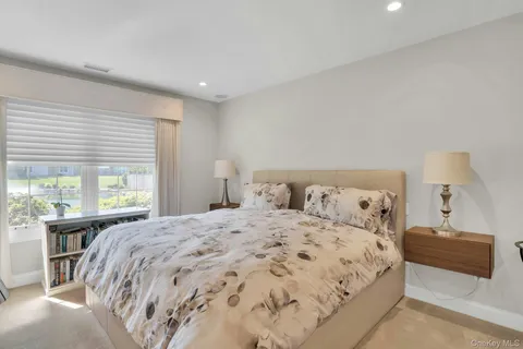 a spacious bathroom with a double vanity sink mirror and double
