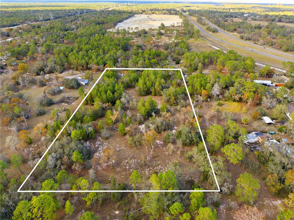 0 Backwoods Way Brooksville, FL 34614 - Photo 3 of 16 a view of a yard