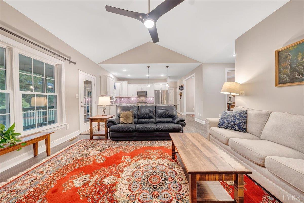 111 Otterview Road Forest, VA 24551 - Photo 15 of 55 a living room with furniture and a large window