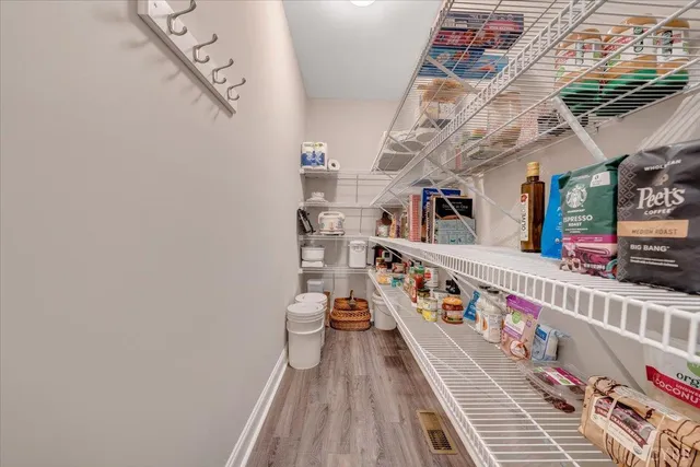 a bedroom with furniture and a bed