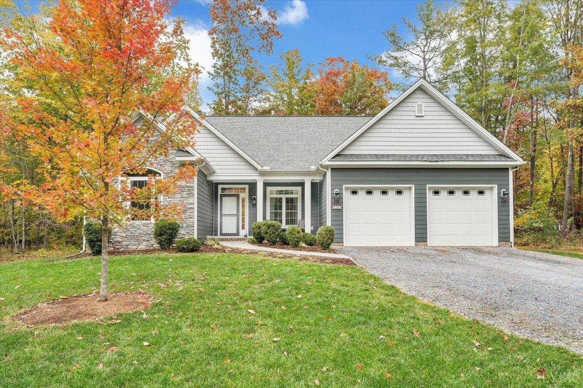 111 Otterview Road Forest, VA 24551 - Photo 2 of 55 a front view of a house with a yard and porch