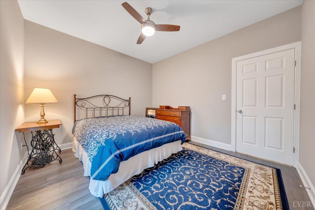 111 Otterview Road Forest, VA 24551 - Photo 27 of 55 a bedroom with bed and window