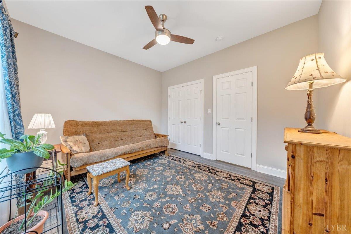 111 Otterview Road Forest, VA 24551 - Photo 29 of 55 a living room with furniture and a rug