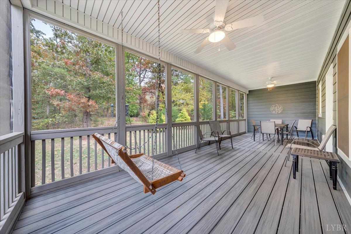 111 Otterview Road Forest, VA 24551 - Photo 32 of 55 a view of a patio with wooden floor and outdoor seating