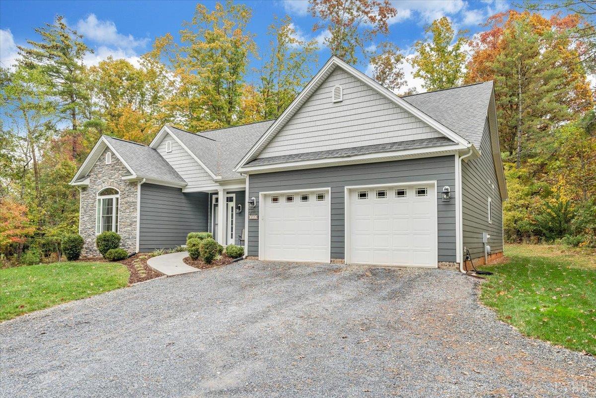 111 Otterview Road Forest, VA 24551 - Photo 44 of 55 a view of a house with a yard and garage