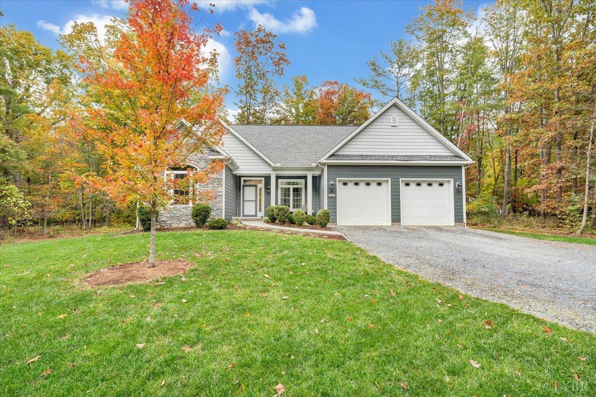 111 Otterview Road Forest, VA 24551 - Photo 46 of 55 a house with green field in front of it