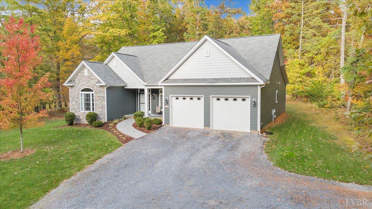 111 Otterview Road Forest, VA 24551 - Photo 50 of 55 a view of a house with a yard and large tree