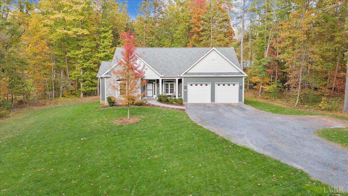 111 Otterview Road Forest, VA 24551 - Photo 53 of 55 a front view of a house with a yard and trees