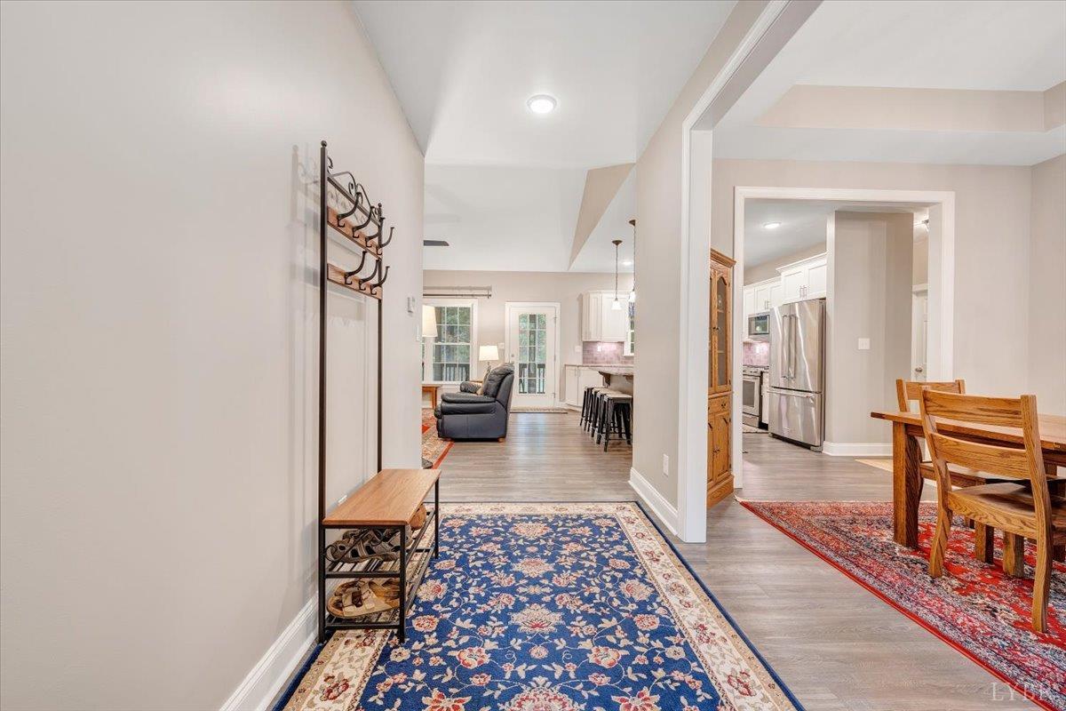 111 Otterview Road Forest, VA 24551 - Photo 7 of 55 a hallway with a white stove top oven and furniture