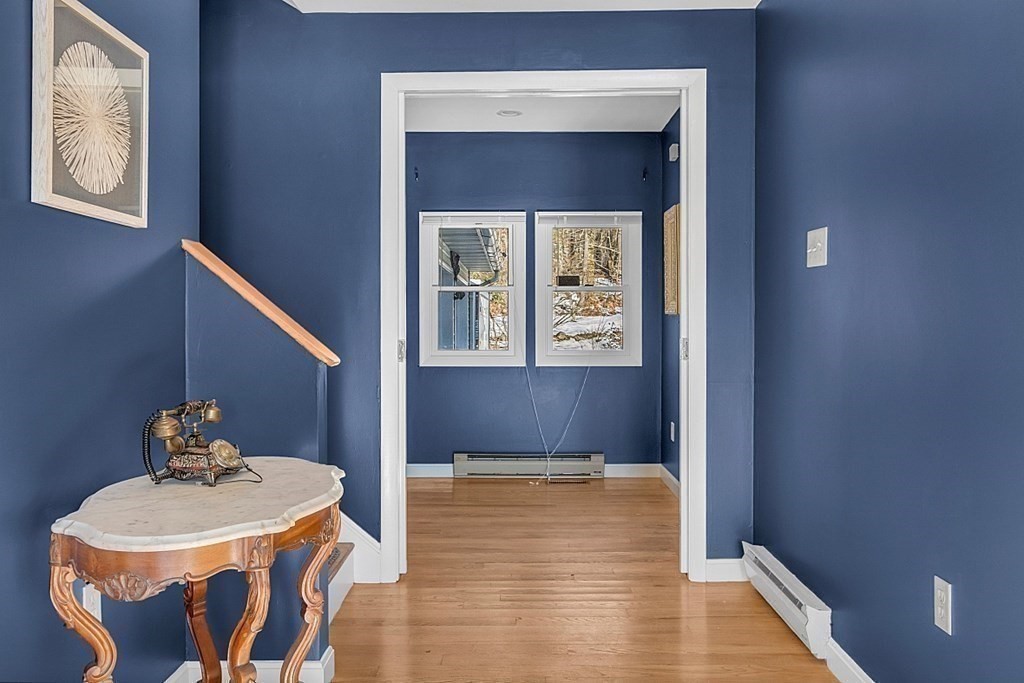 105 Secret Lake Road Phillipston, MA 01331 - Photo 11 of 42 a view of a dining room with furniture and wooden floor