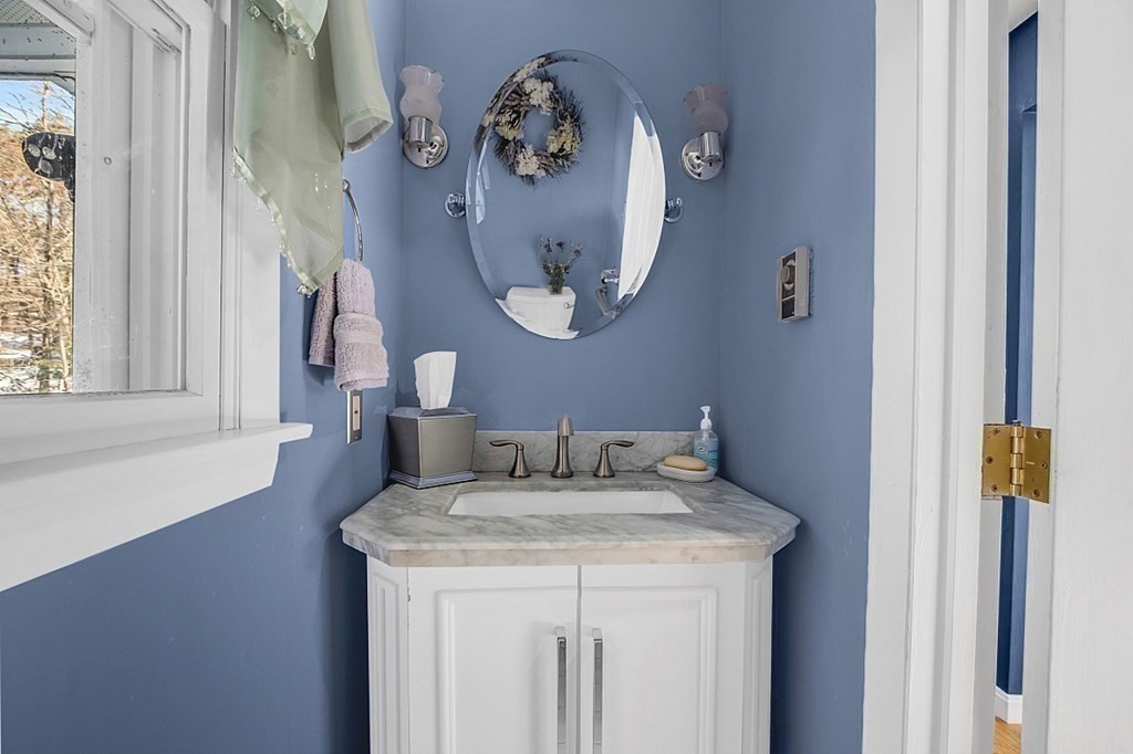 105 Secret Lake Road Phillipston, MA 01331 - Photo 20 of 42 a bathroom with a sink and a mirror