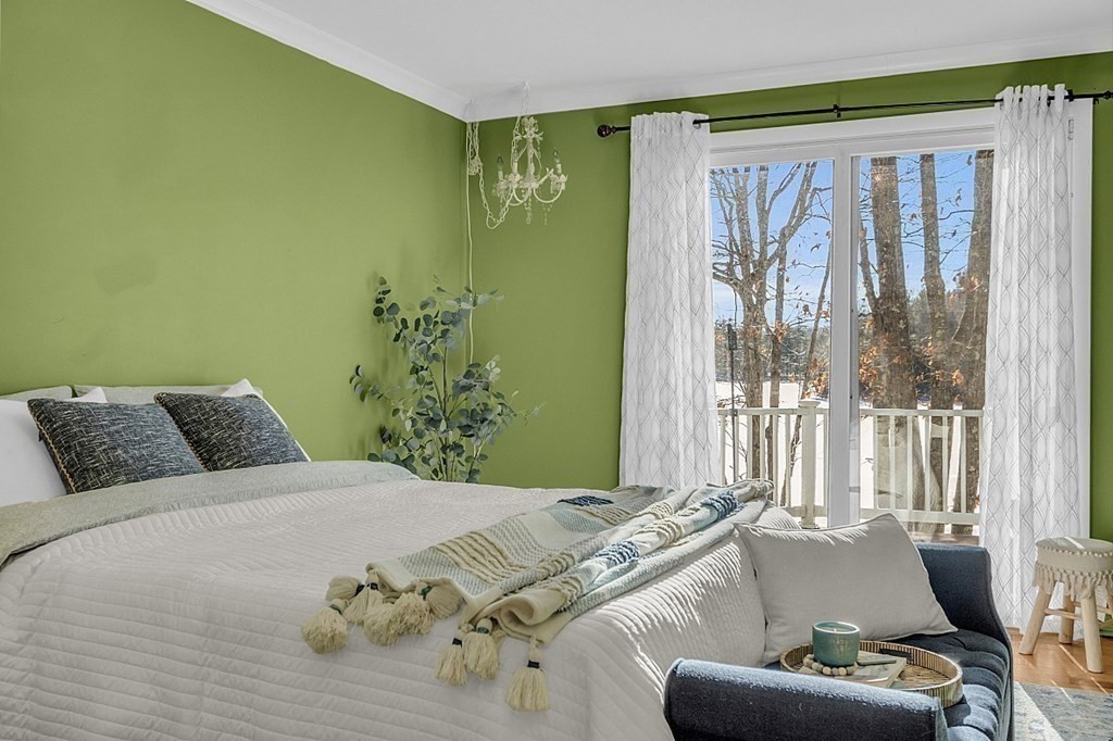105 Secret Lake Road Phillipston, MA 01331 - Photo 23 of 42 a bedroom with a bed and a couch