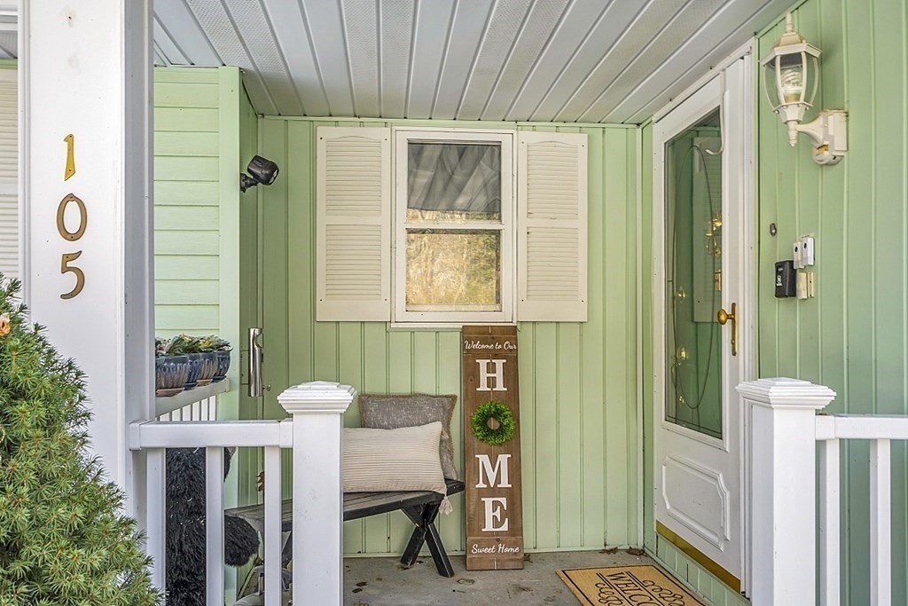 105 Secret Lake Road Phillipston, MA 01331 - Photo 40 of 42 a view of a balcony with table and chairs