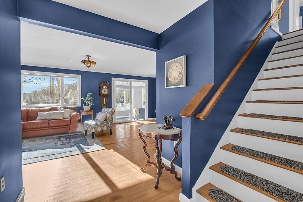 105 Secret Lake Road Phillipston, MA 01331 - Photo 6 of 42 a living room with furniture and a large window