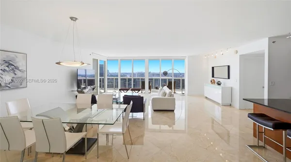 a view of a dining room with furniture