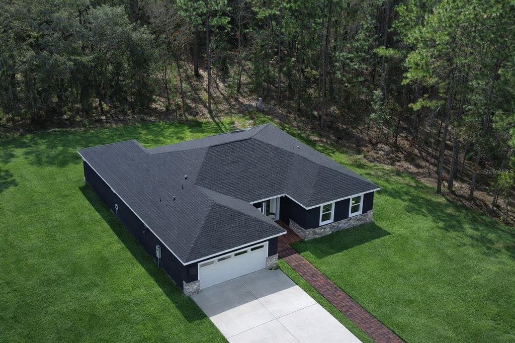 12222 Southwest 95th Place Dunnellon, FL 34432 - Photo 3 of 23 an aerial view of a house with a yard