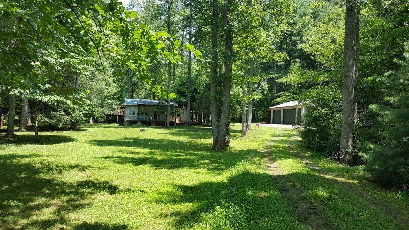 429 Roland Branch Road Henry, VA 24102 - Photo 2 of 33 a view of a house with a backyard