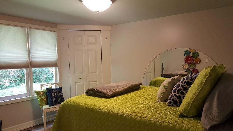 429 Roland Branch Road Henry, VA 24102 - Photo 18 of 33 a bedroom with a bed and a window