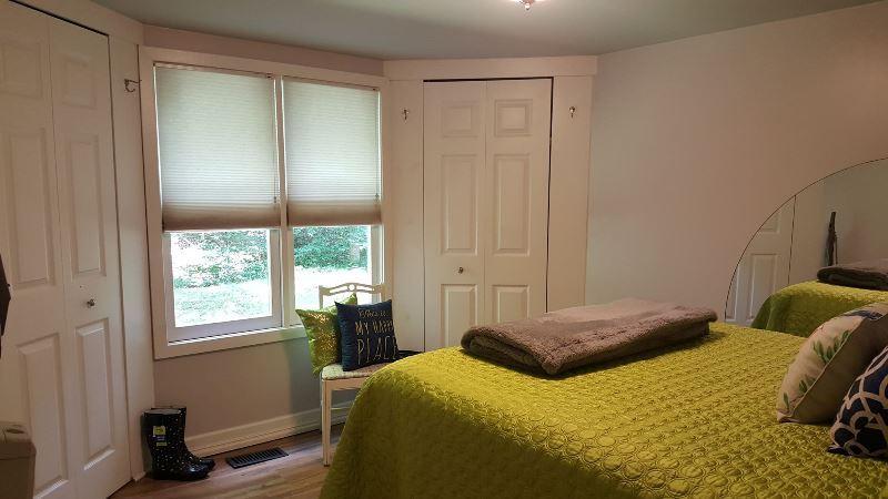 429 Roland Branch Road Henry, VA 24102 - Photo 19 of 33 a bedroom with a bed and a window