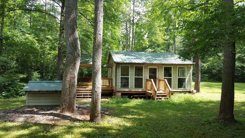 429 Roland Branch Road Henry, VA 24102 - Photo 20 of 33 a view of a house with backyard porch and sitting area
