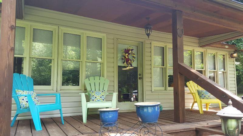 429 Roland Branch Road Henry, VA 24102 - Photo 4 of 33 a view of a two chairs in the balcony