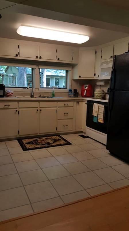 429 Roland Branch Road Henry, VA 24102 - Photo 7 of 33 a kitchen with granite countertop a stove and a refrigerator