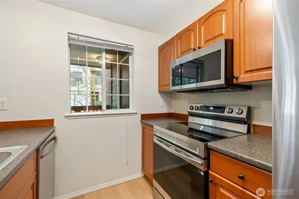 $339,998 | 15433 Country Club Drive, Unit E202, Mill Creek, WA 98012