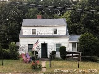 48 Sand Pit Road Danbury, CT 06810 - Photo 1 of 1 a front view of a house with garden