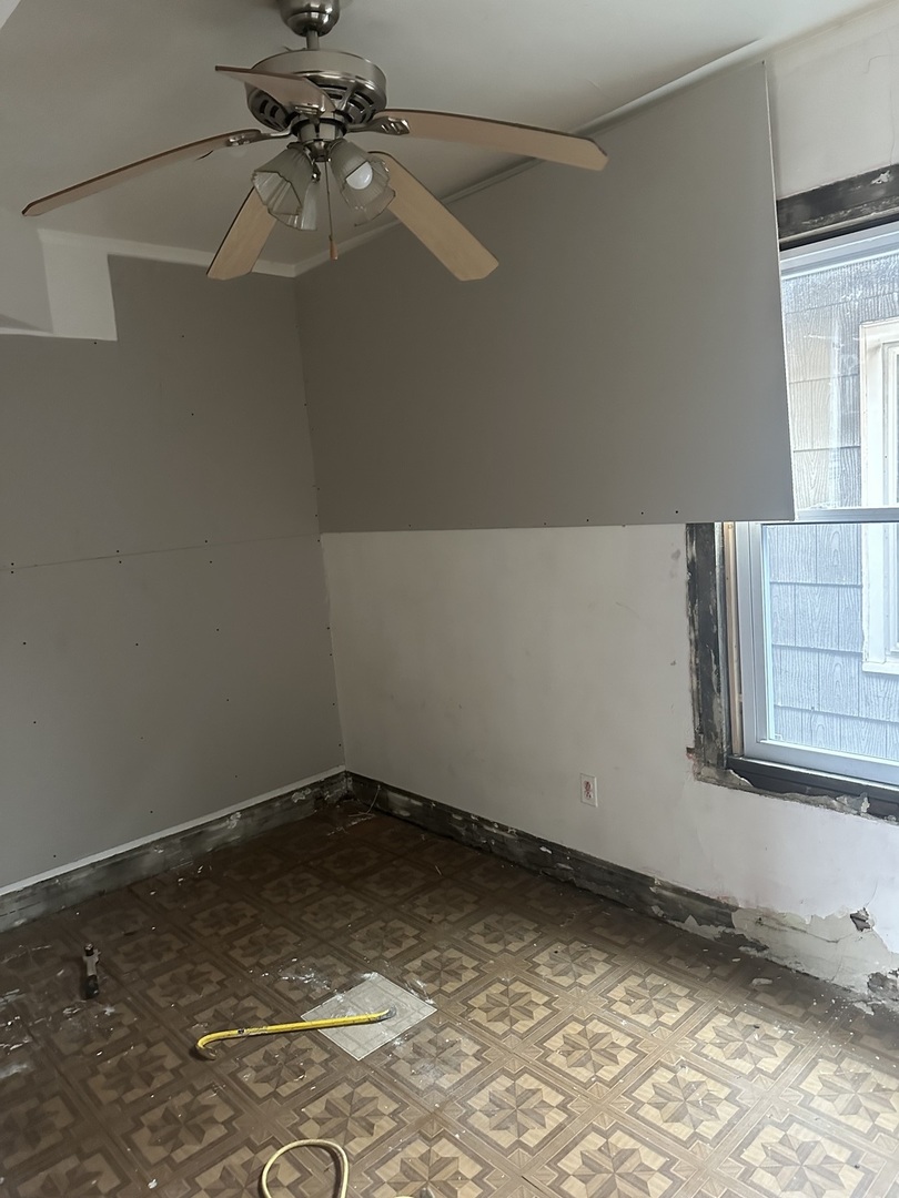 11809 South Indiana Avenue Chicago, IL 60628 - Photo 14 of 21 a view of a window in an empty room