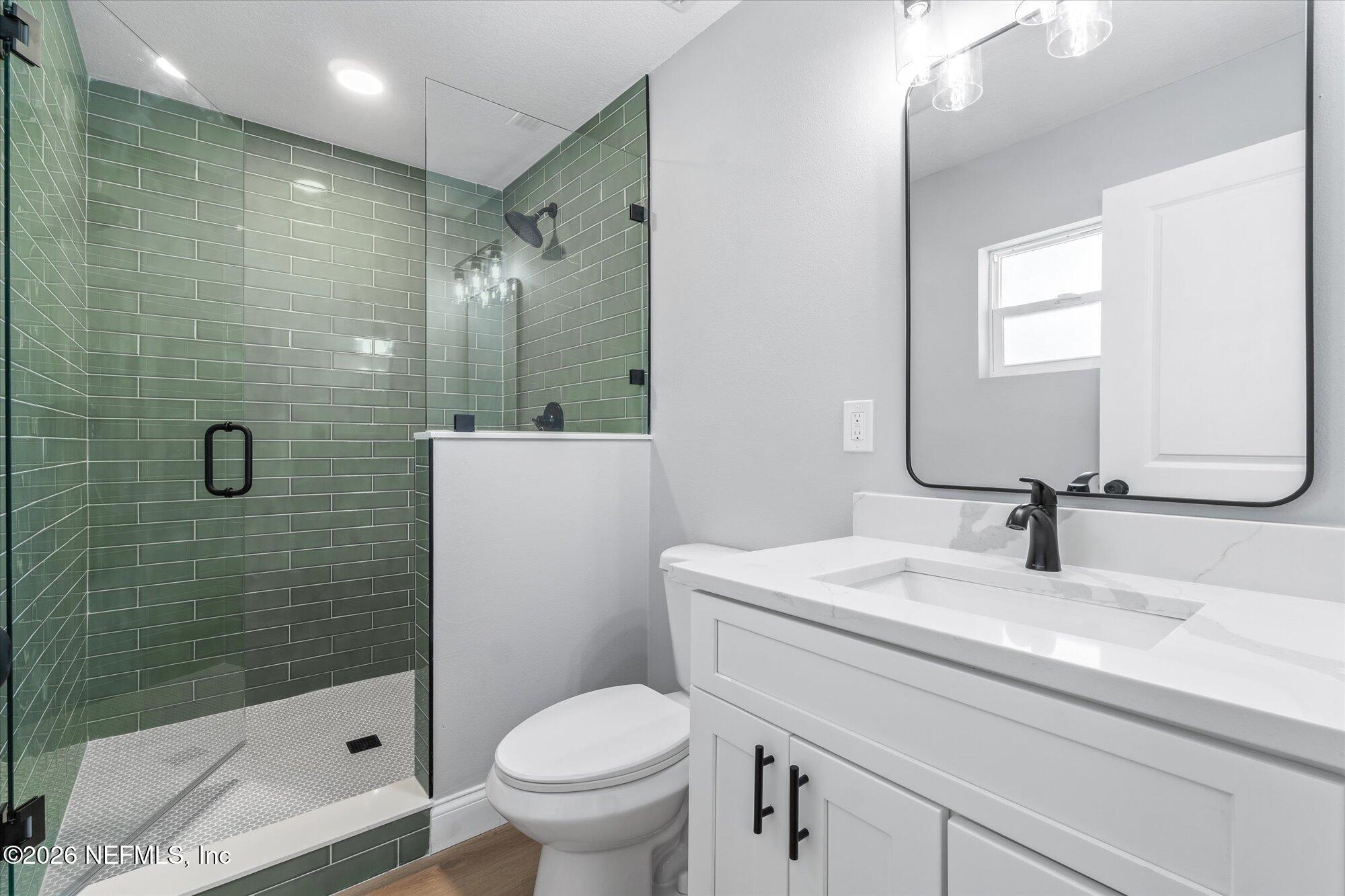 102 Mullins Road Interlachen, FL 32148 - Photo 20 of 45 a bathroom with a sink a toilet and shower