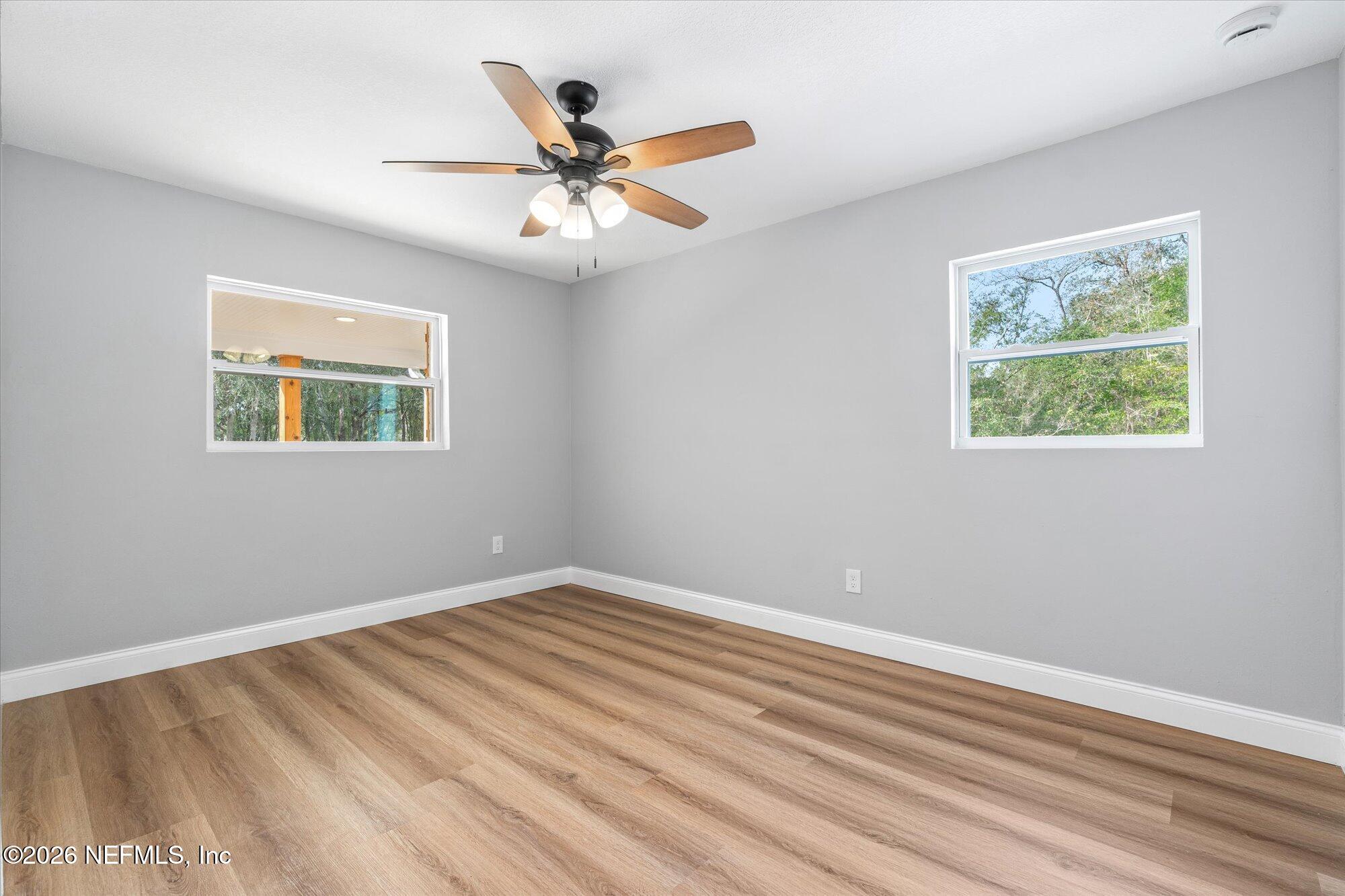 102 Mullins Road Interlachen, FL 32148 - Photo 26 of 45 a view of an empty room with a window