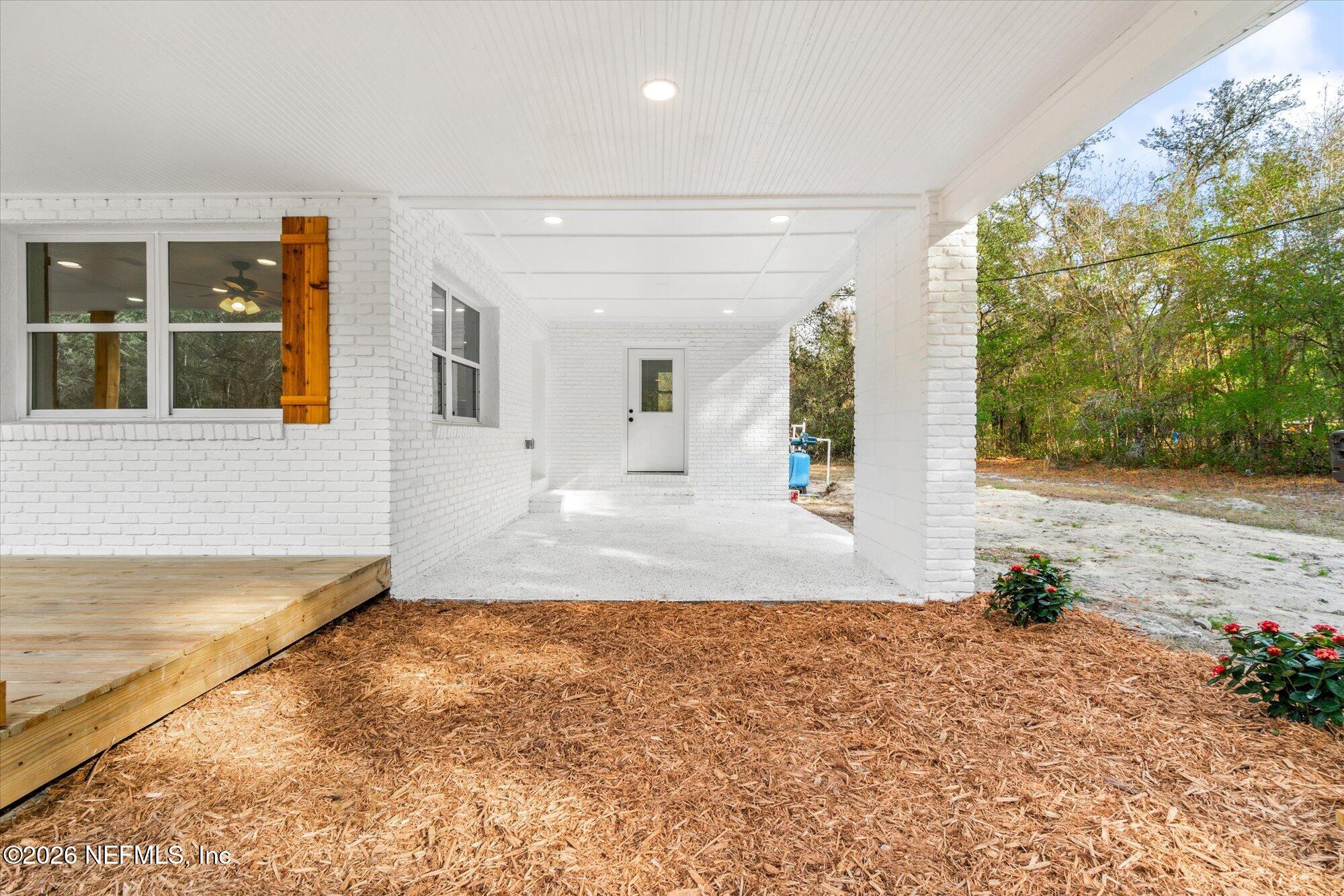 102 Mullins Road Interlachen, FL 32148 - Photo 3 of 45 a view of a house with a yard