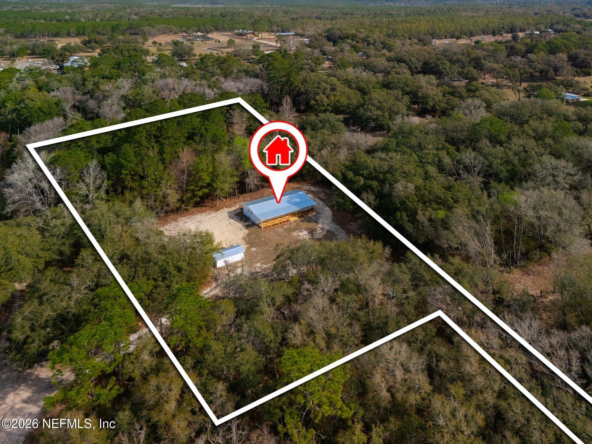 102 Mullins Road Interlachen, FL 32148 - Photo 44 of 45 a view of a forest from a balcony