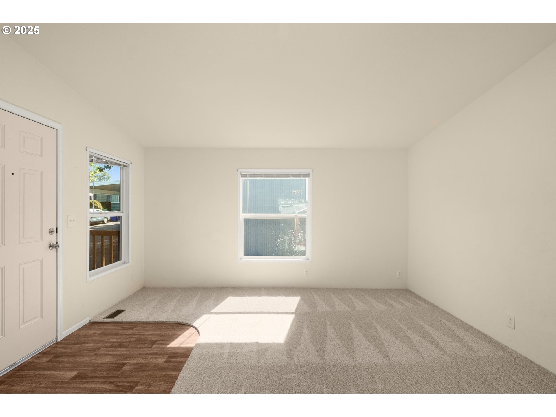 21100 Northeast Sandy Boulevard, Unit 76 Fairview, OR 97024 - Photo 6 of 23 a view of an empty room and window