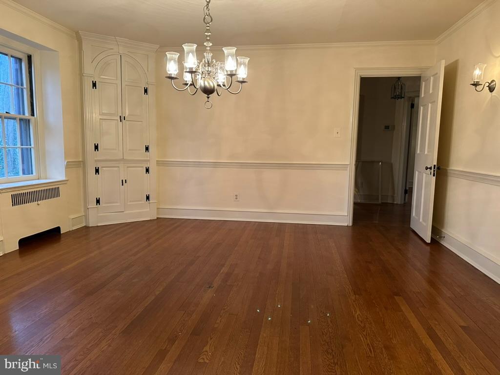 602 Bellevue Road Wilmington, DE 19809 - Photo 19 of 56 wooden floor in an empty room with a window