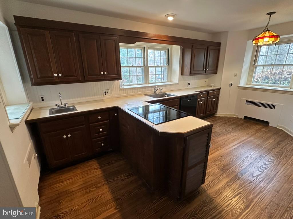 602 Bellevue Road Wilmington, DE 19809 - Photo 25 of 56 a kitchen with wooden cabinets and sink