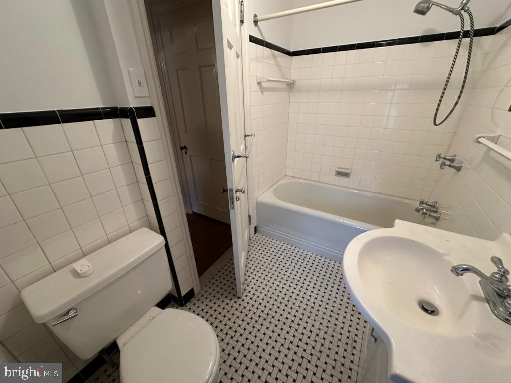 602 Bellevue Road Wilmington, DE 19809 - Photo 30 of 56 a bathroom with a sink toilet and shower