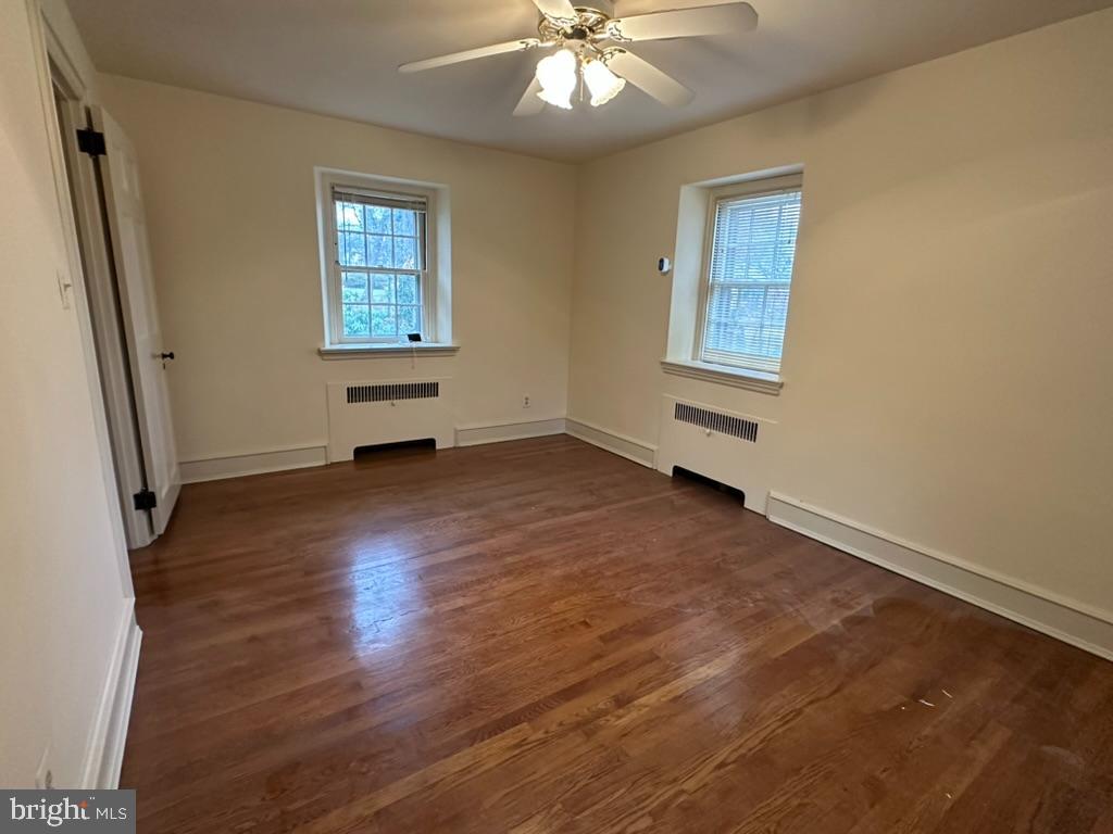 602 Bellevue Road Wilmington, DE 19809 - Photo 34 of 56 a view of an empty room with wooden floor and a window