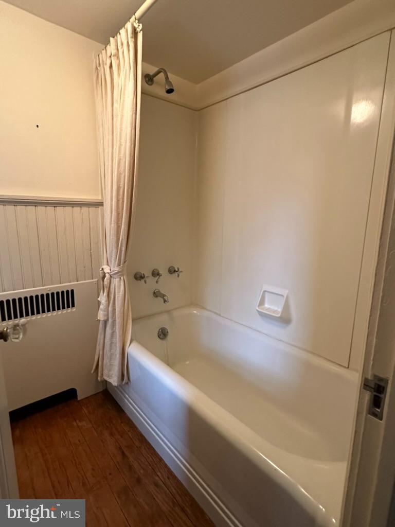 602 Bellevue Road Wilmington, DE 19809 - Photo 39 of 56 a bathroom with a bathtub and a shower