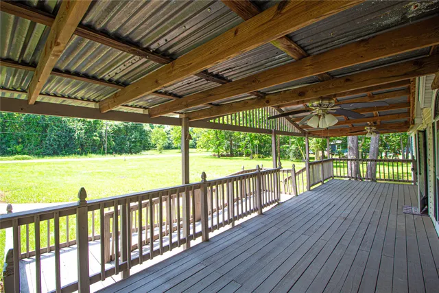 a view of porch with wooden floor in outdoor space
